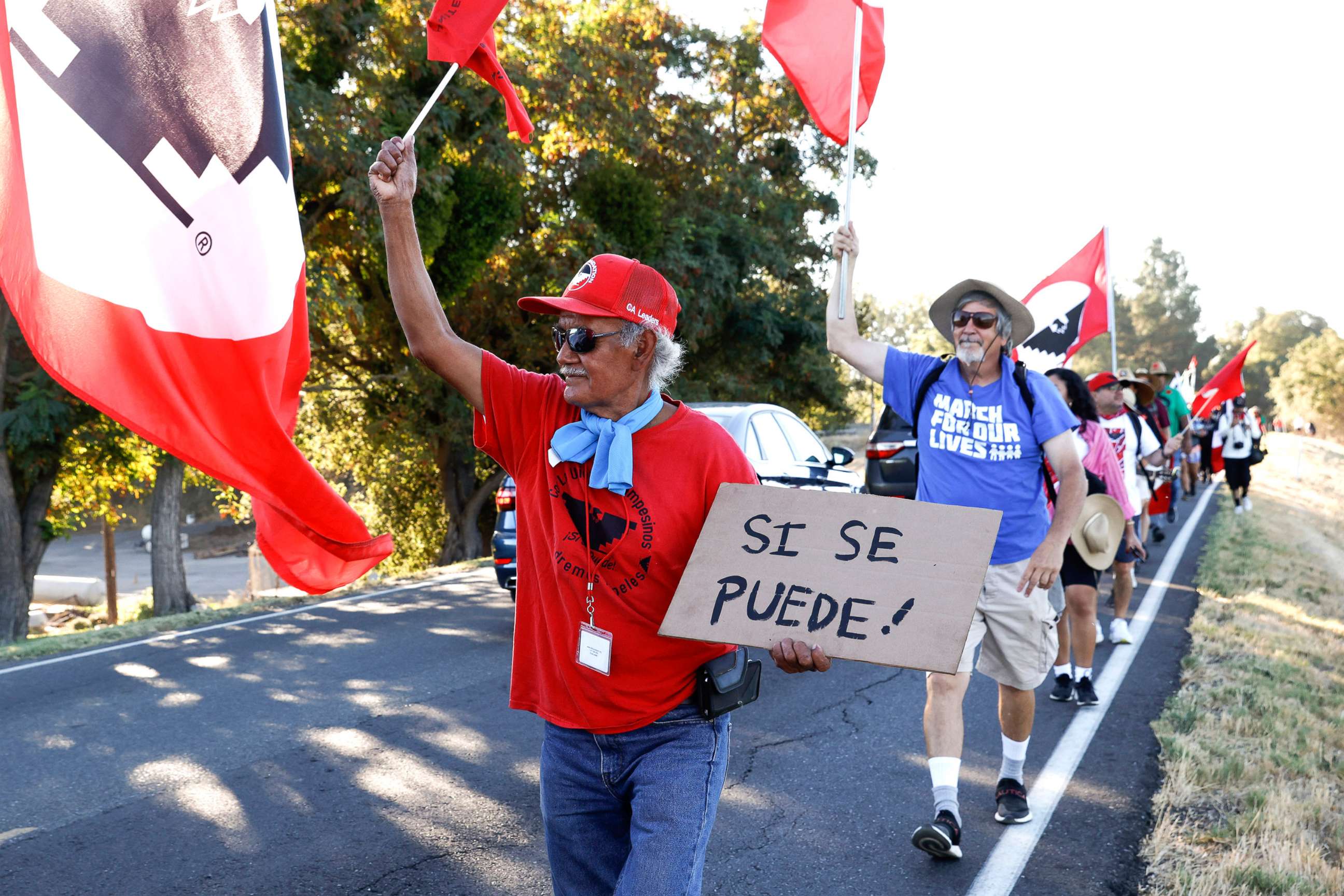 PHOTO: Fresno farm worker Asuncionn Ponce marches with fellow United Farm Workers members from Walnut Grove, Calif. to Elk Grove, Calif., Aug. 24, to urge Gov. Gavin Newsom to sign AB 2183, a bill allowing farm workers to vote by mail in union elections.