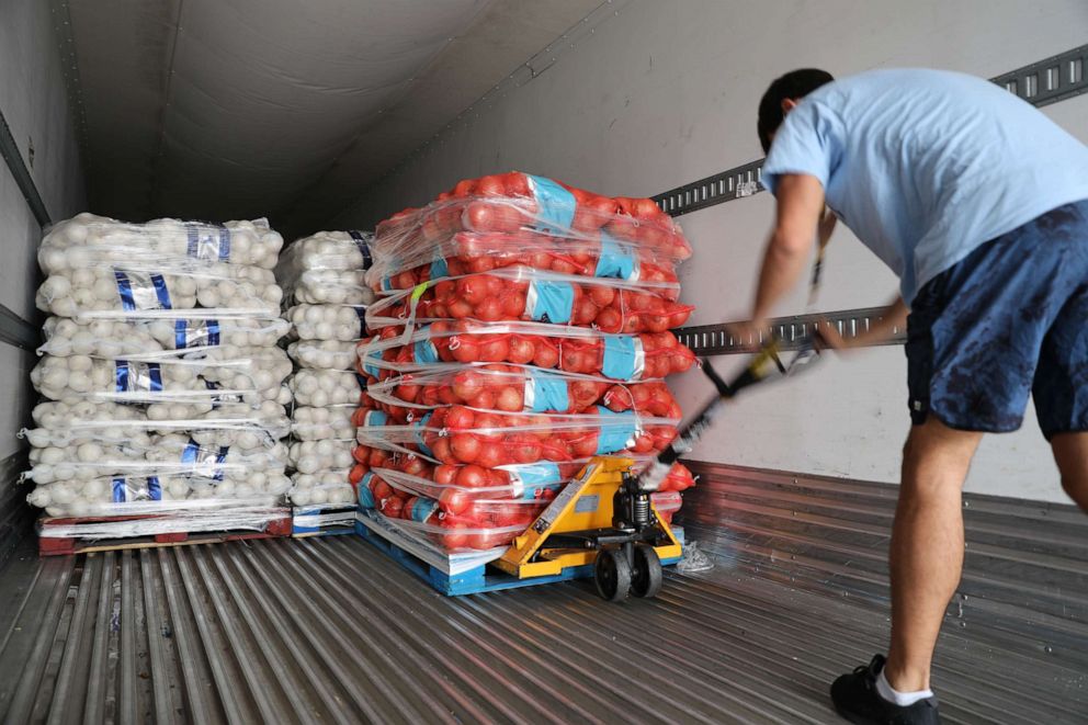 PHOTO: Farmlink volunteers help deliver food picked up from farms to food banks. The group, started by college students, has delivered more than 250,000 pounds of food to food banks in the last three weeks.