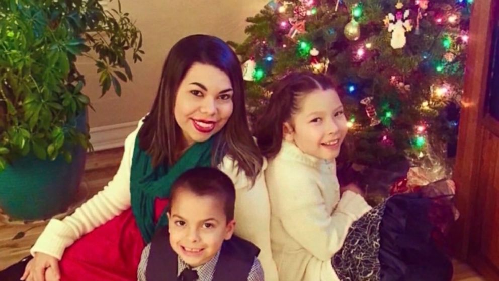 Antoinette Suina poses in this undated photo with her 9-year-old daughter, Ariana Suina, and 6-year-old son, Joel Mumaw, who was killed when an Albuquerque, N.M., police officer racing to a crime in progress hit their vehicle in April 2017.