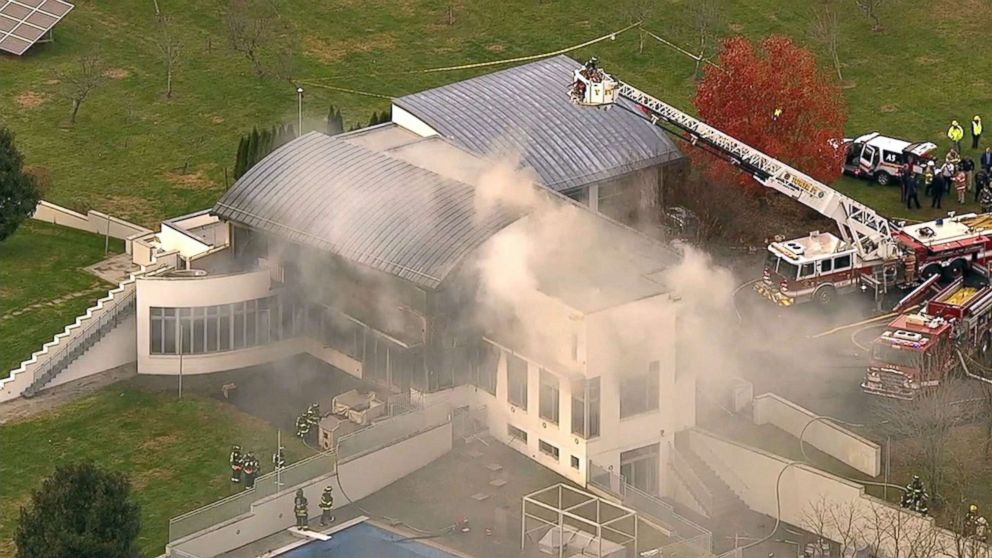 PHOTO: Firefighters battle a blaze in a house in Colts Neck, N.J., Nov. 20, 2018.