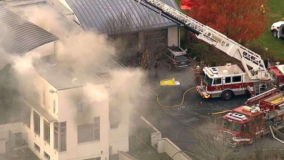 PHOTO: Firefighters battle a blaze in a house in Colts Neck, N.J., Nov. 20, 2018.