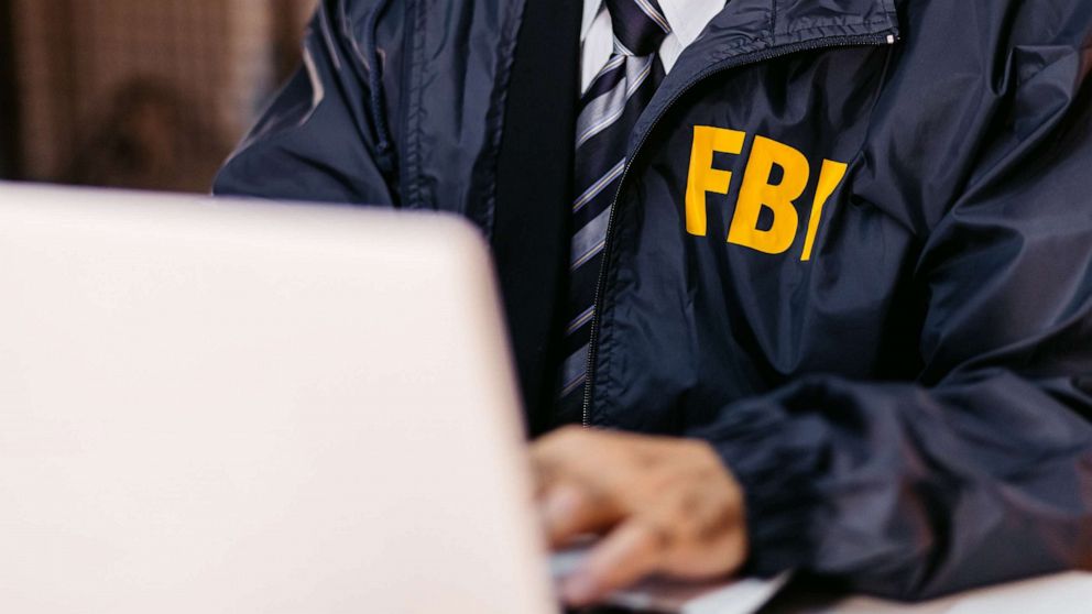 PHOTO: Stock photo of an FBI agent using a computer.