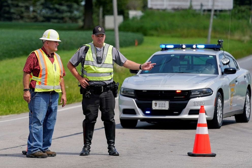 PHOTO: An Ohio State Trooper directs traffic in Wilmington, Ohio, after police closed off Interstate 71 North after reports of a suspect attempting to attack the FBI building in Cincinnati, Aug. 11, 2022.