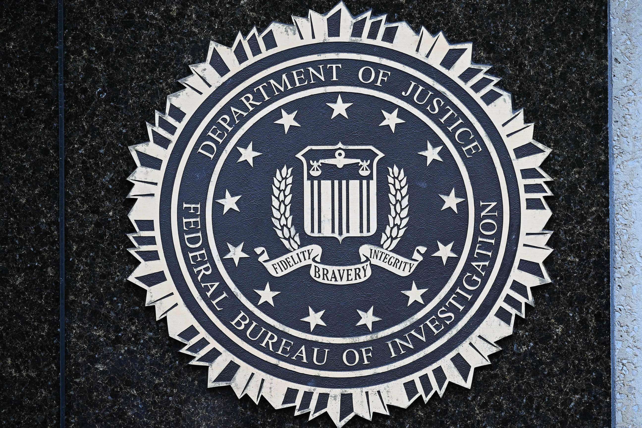 PHOTO: FILE - The seal of the Federal Bureau of Investigation is seen outside of its headquarters in Washington, DC, Aug. 15, 2022.