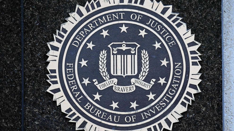 PHOTO: FILE - The seal of the Federal Bureau of Investigation is seen outside of its headquarters in Washington, DC, August 15, 2022.