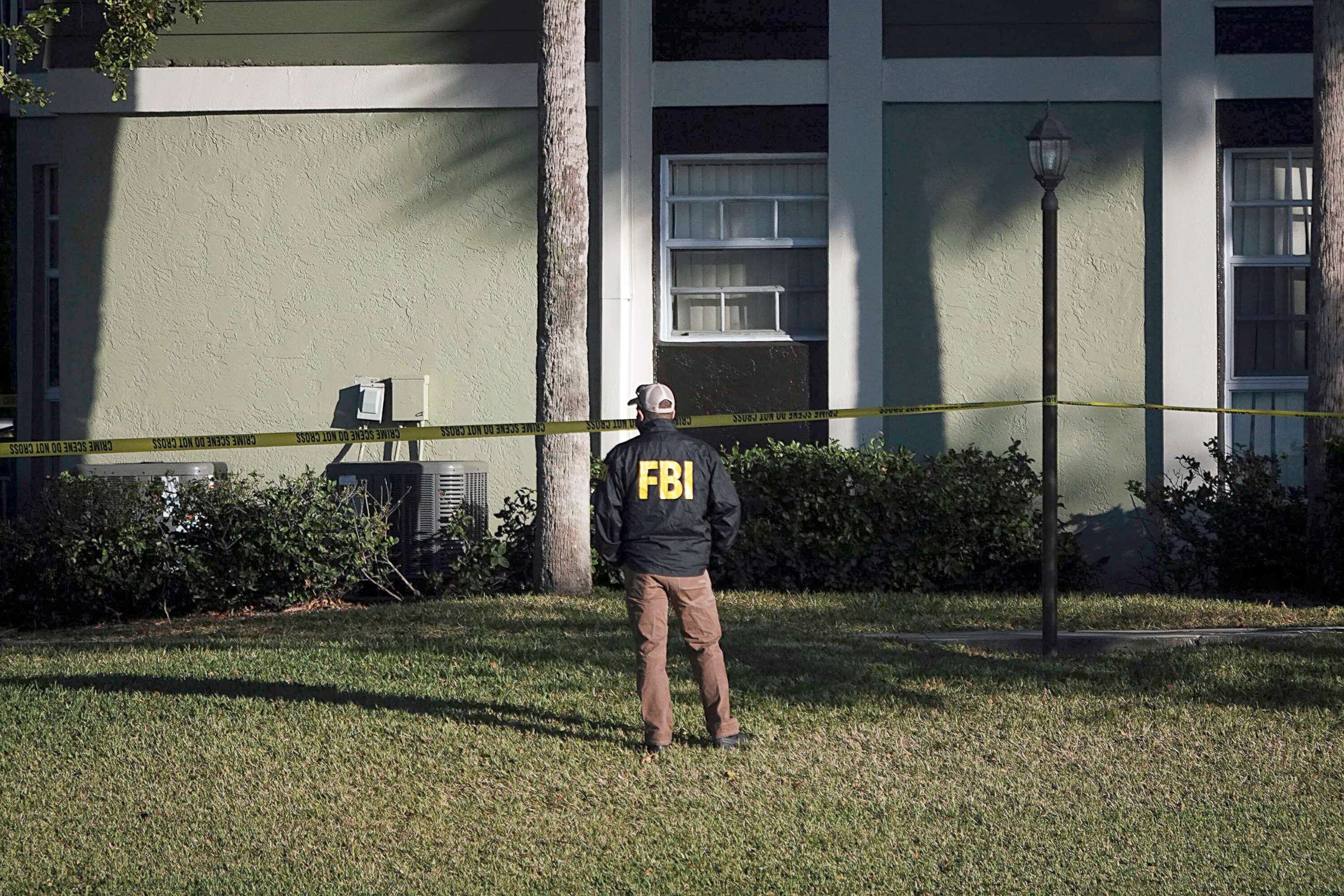 PHOTO: Law enforcement personnel continue to work at an apartment complex the day after a deadly shooting in Sunrise, Fla., Feb. 3, 2021. 