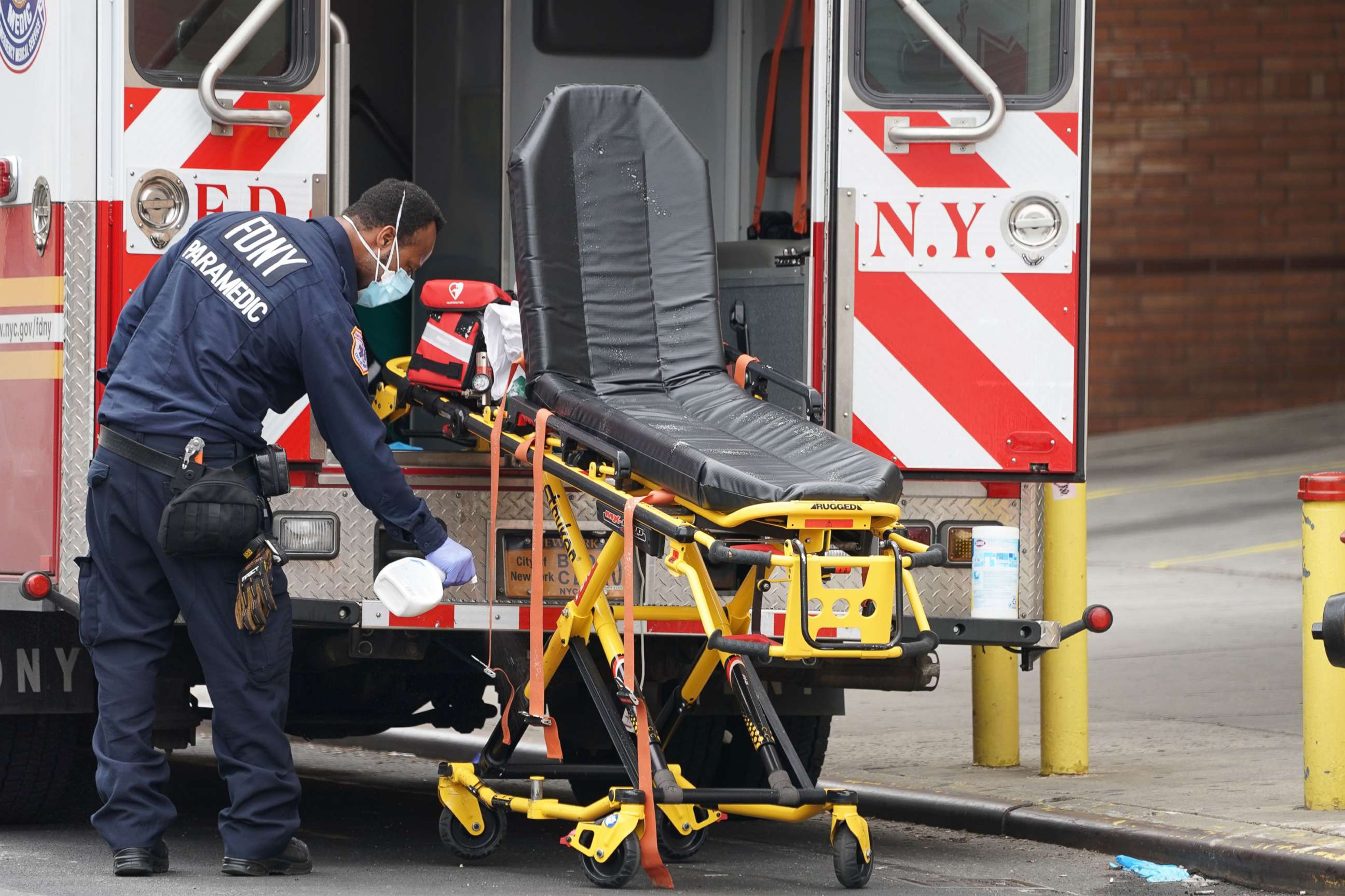 PHOTO: An FDNY paramedic disinfects the ambulance equipment after bringing a patient to Wyckoff Hospital in the Bushwick section of Brooklyn, April 5, 2020, in New York.