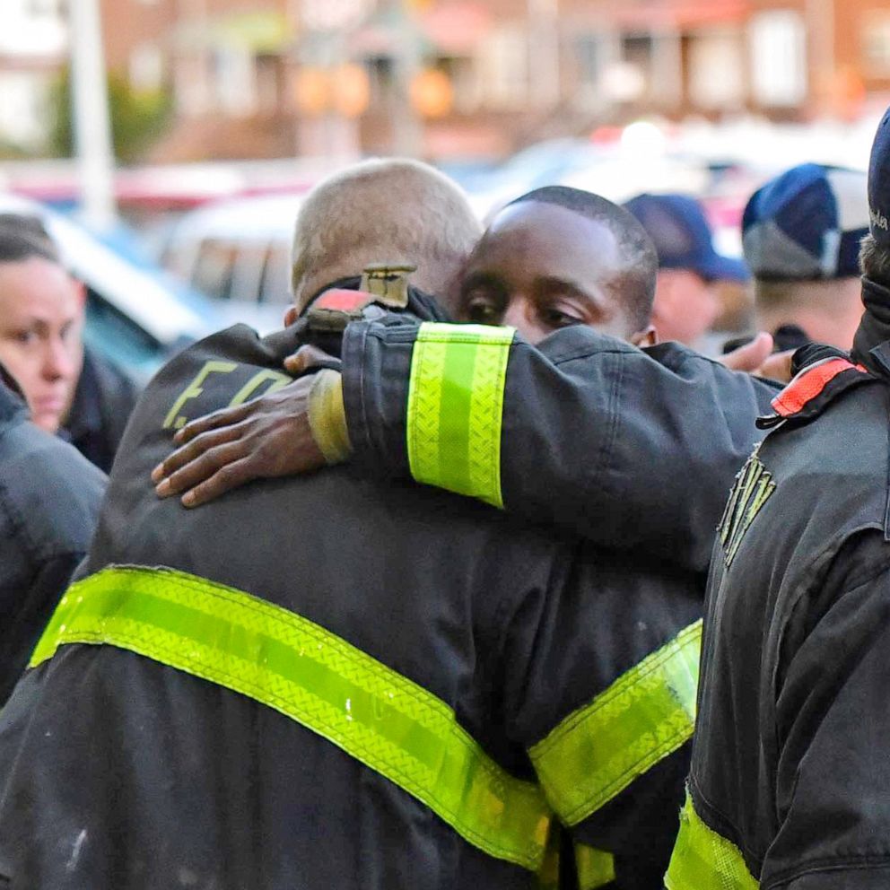 PHOTO: FDNY members grieve as they salute firefighter Timothy Klein during his dignified transfer, in an image posted by the FDNY to their Instagram account on April 24, 2022. Klein was injured in a building collapse while he was fighting the fire.
