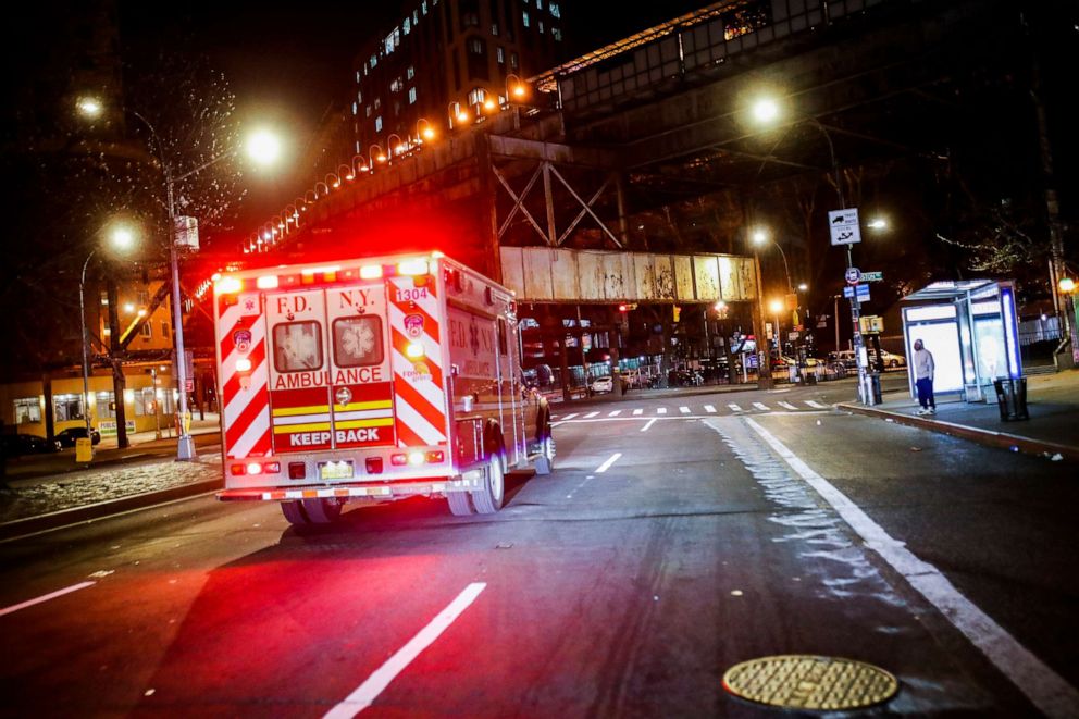 PHOTO: FDNY paramedic Elizabeth Bonilla drives to an emergency call along an empty street on her second consecutive shift on April 15, 2020, in the Bronx borough of New York City.