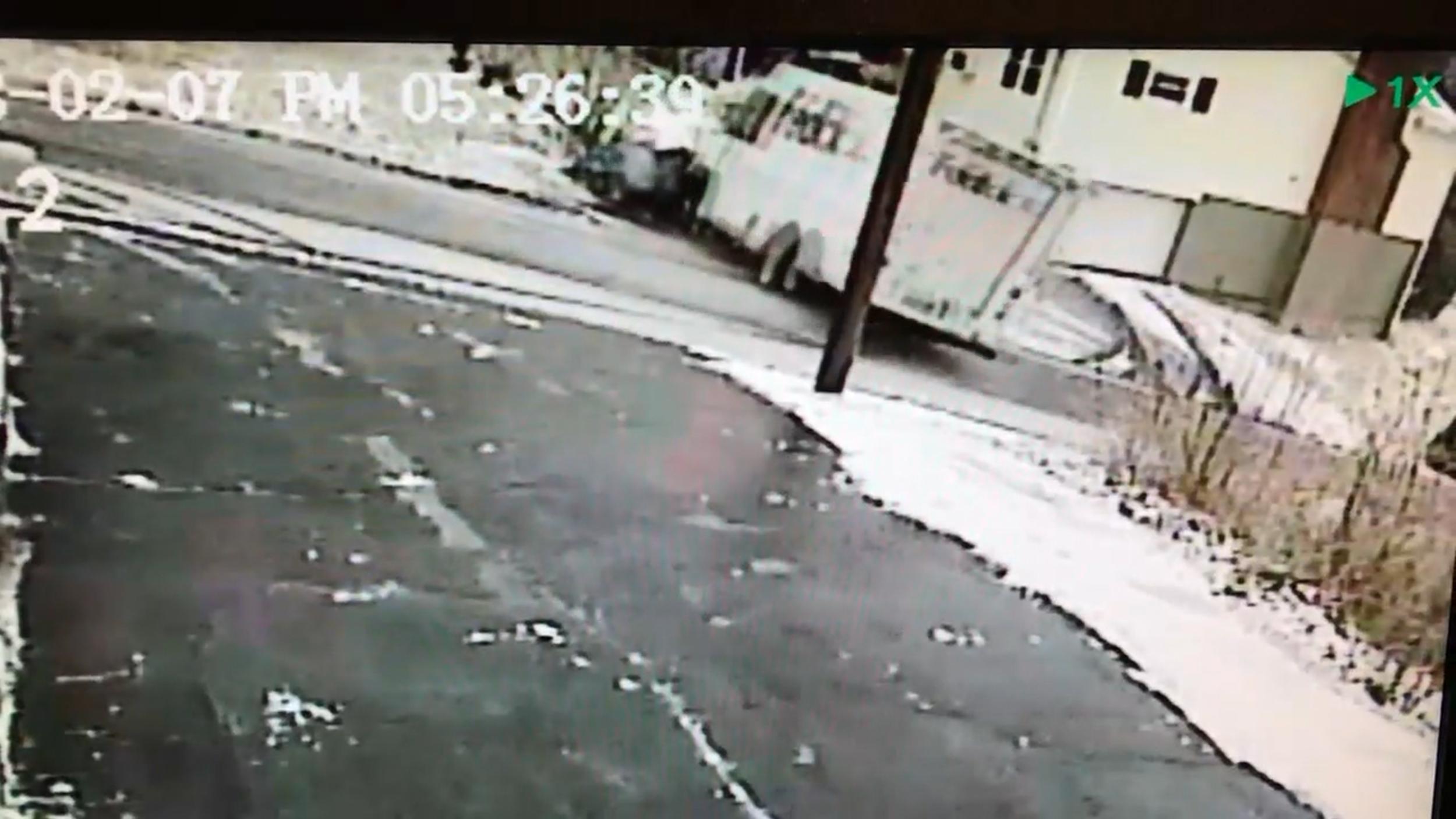 PHOTO: In a surveillance video obtained by ABC News a FedEx truck is seen spiraling out of control on a Connecticut street. 