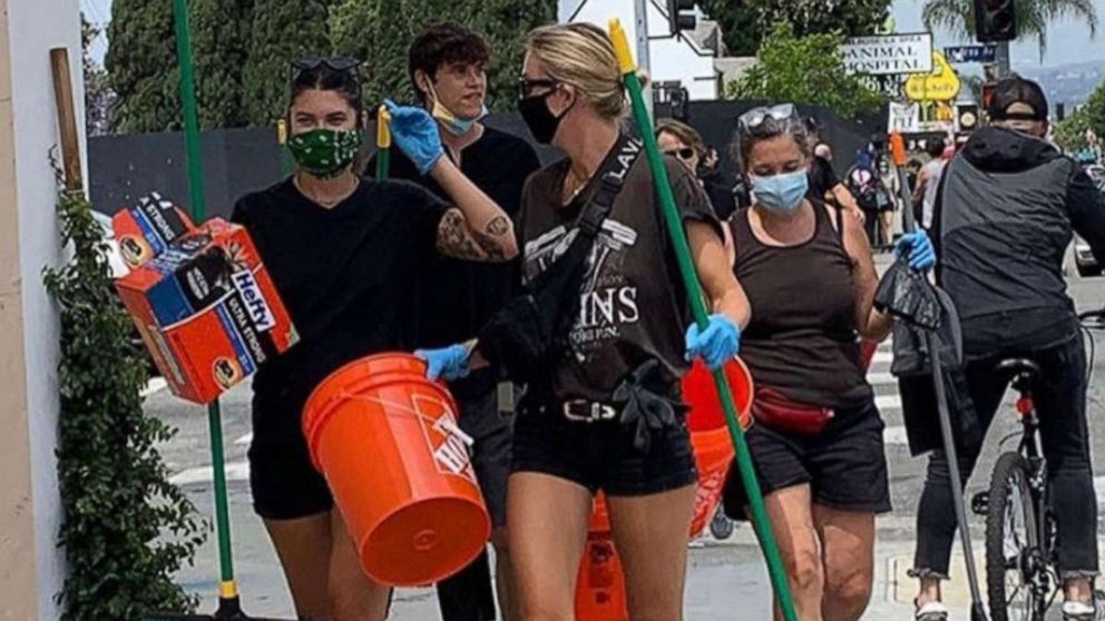 PHOTO: Volunteers from the group "Feed the Streets LA" assist with clean-up efforts in Los Angeles, California amid Black Lives Matter protests in wake of George Floyd's death.