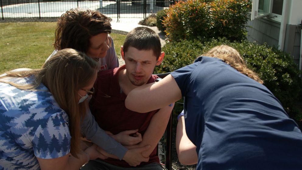 PHOTO: Jack Feldman, 20, has a rare genetic disorder that put him at high-risk of catching COVID-19. His mother, Barbara Feldman, struggled with finding a safe place to vaccinate him. 