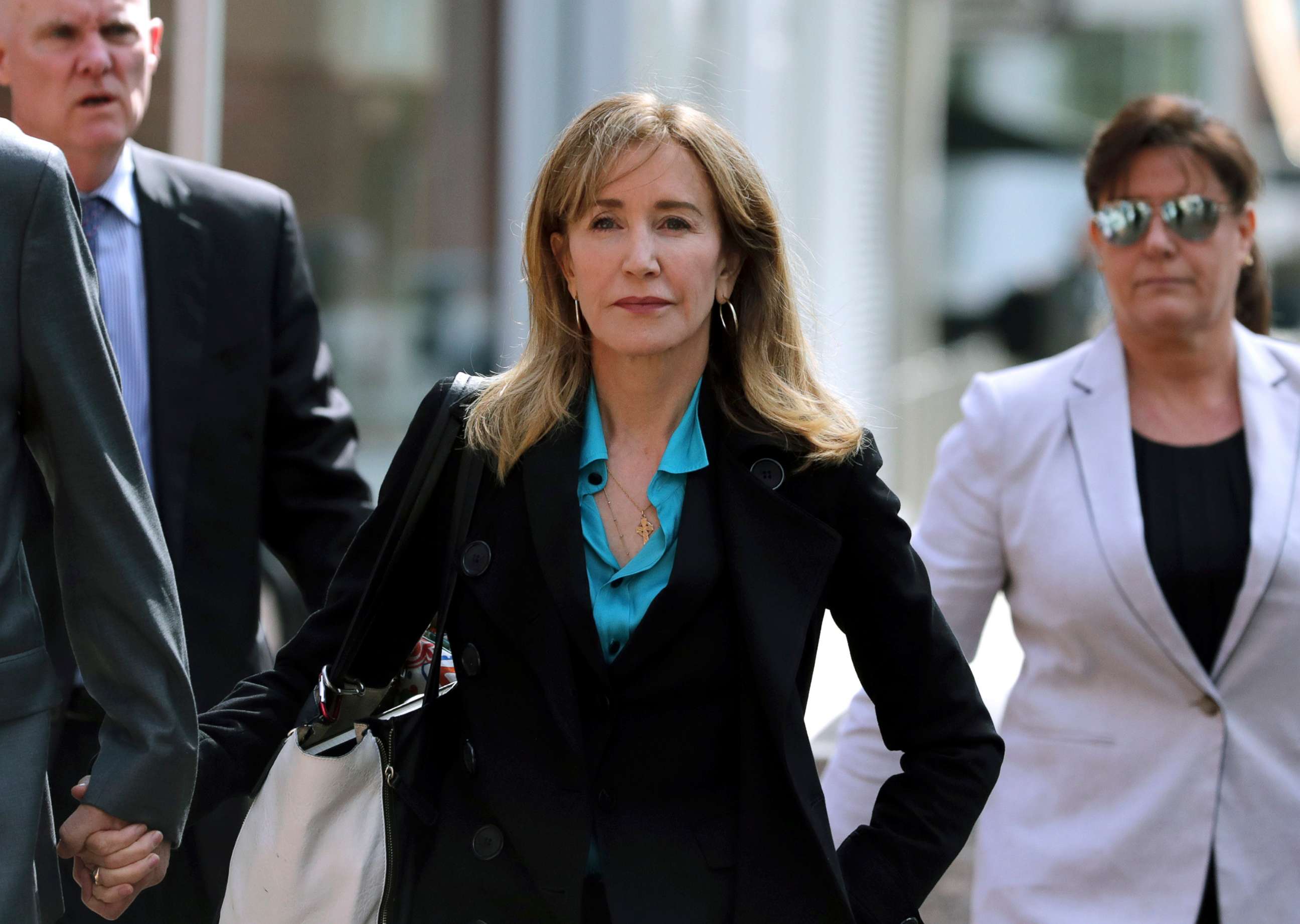 PHOTO: Actress Felicity Huffman arrives at federal court in Boston, April 3, 2019, to face charges in a nationwide college admissions bribery scandal.