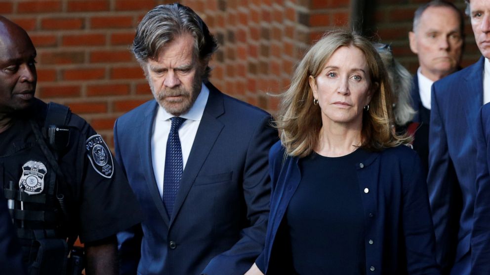PHOTO: Actress Felicity Huffman leaves the federal courthouse with her husband William H. Macy, after being sentenced in connection with a nationwide college admissions cheating scheme in Boston, Mass., September 13, 2019.