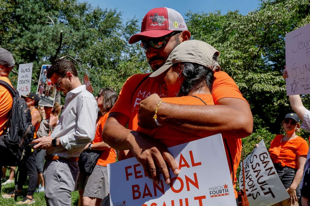 PHOTO: Kimberly and Felix Rubio console one another after speaking about their daughter Lexi Rubio during the March Fourth rally against assault weapons on Capitol Hill in Washington, July 13, 2022.