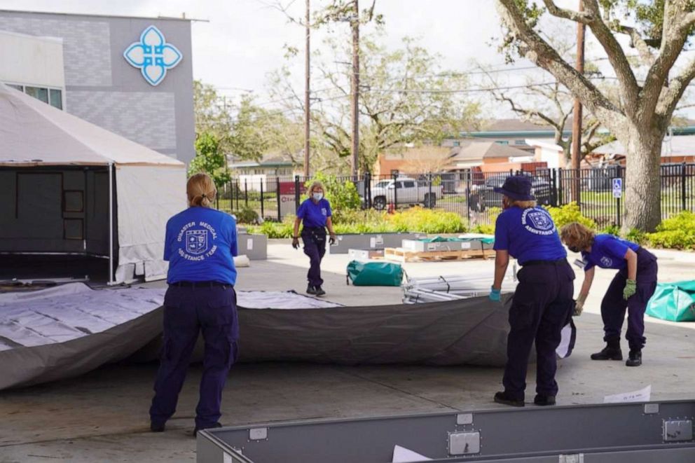PHOTO: A Disaster Medical Assistance Team sets up tents at Lake Charles Memorial Hospital to provide support in response to Hurricane Laura, Lake Charles, La., Aug. 29, 2020. 