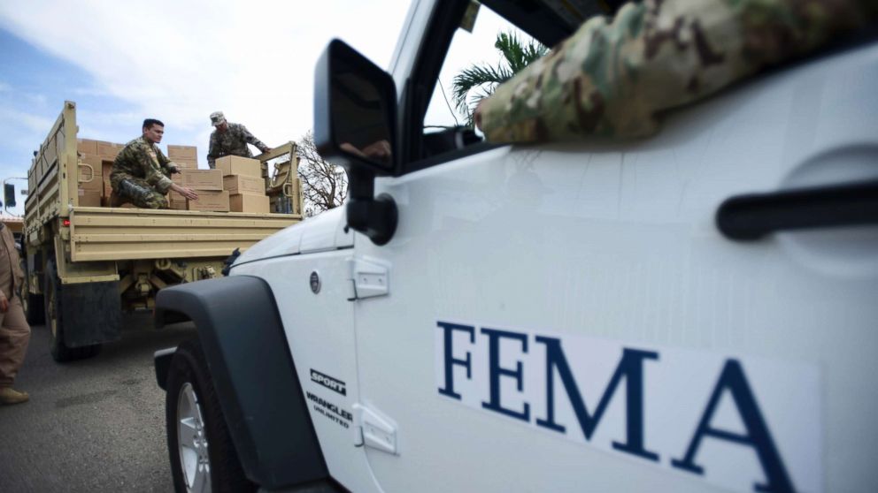PHOTO: Department of Homeland Security personnel deliver supplies to Santa Ana community residents in the aftermath of Hurricane Maria in Guayama, Puerto Rico, Oct. 5, 2017. 