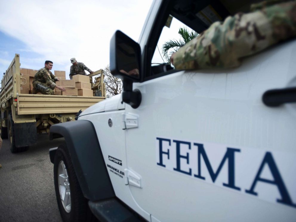 PHOTO: Department of Homeland Security personnel deliver supplies to Santa Ana community residents in the aftermath of Hurricane Maria in Guayama, Puerto Rico, Oct. 5, 2017.