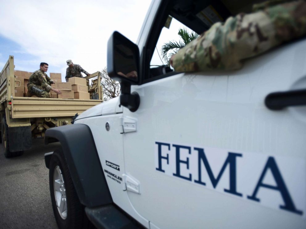 PHOTO: Department of Homeland Security personnel deliver supplies to Santa Ana community residents in the aftermath of Hurricane Maria in Guayama, Puerto Rico, Oct. 5, 2017.