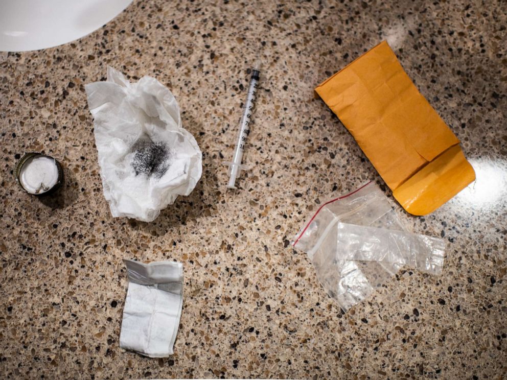 PHOTO: Drugs and a syringe are seen on a sink after a woman was interrupted while preparing to inject a mix of heroin and fentanyl inside a Walmart bathroom in Manchester, N.H., Feb. 10, 2019.