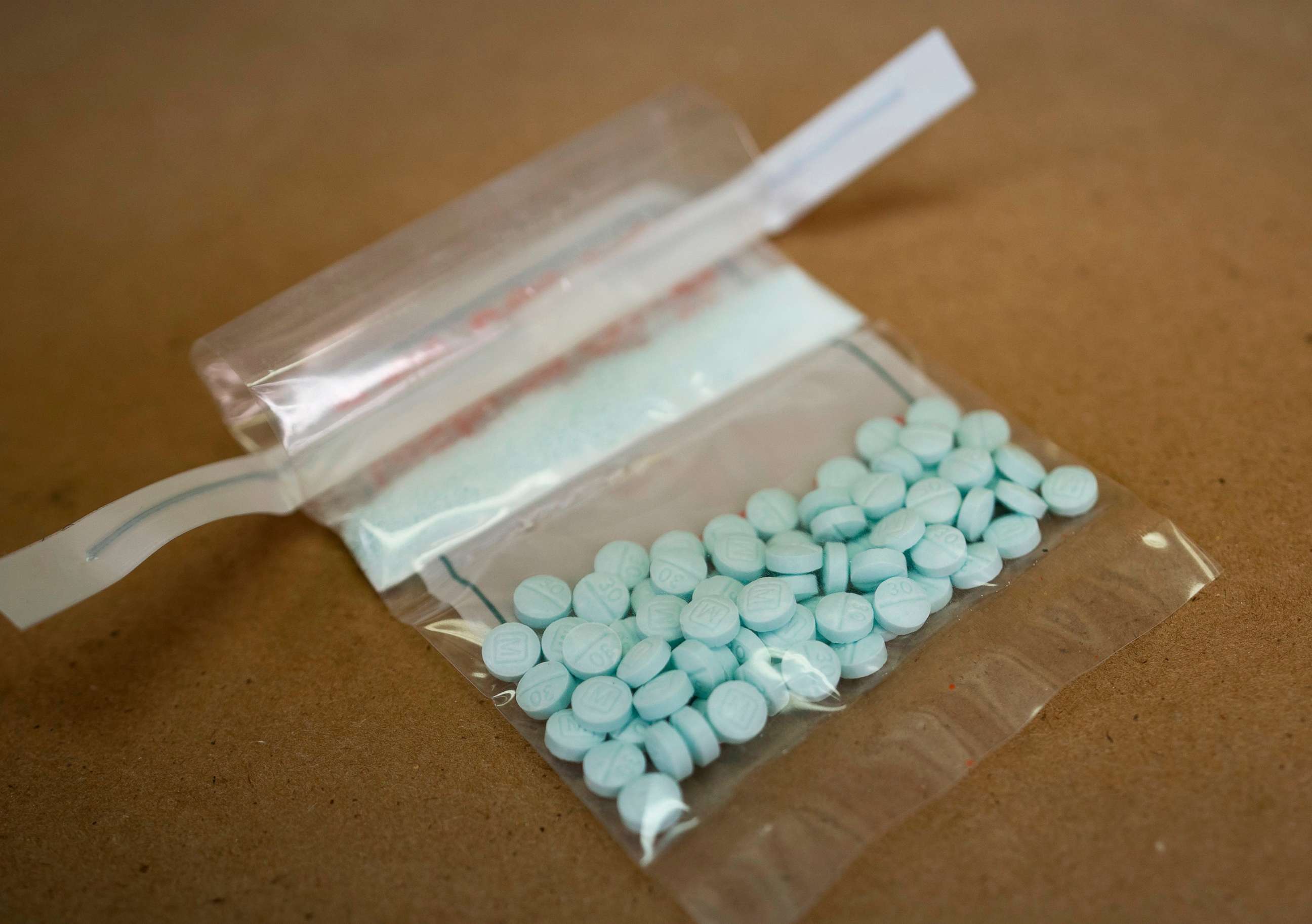 PHOTO: Tablets believed to be laced with fentanyl are displayed at the Drug Enforcement Administration Northeast Regional Laboratory on Oct. 8, 2019 in New York.