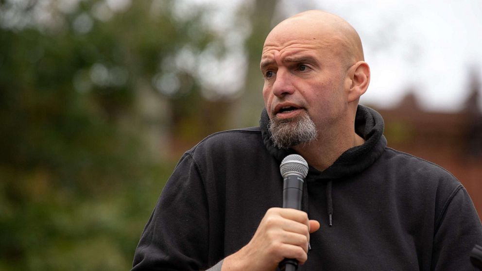 PHOTO: Pennsylvania's Lieutenant Governor John Fetterman speaks to supporters gathered in Dickinson Square Park in Philadelphia as he campaigns for the US Senate, Oct. 23, 2022.