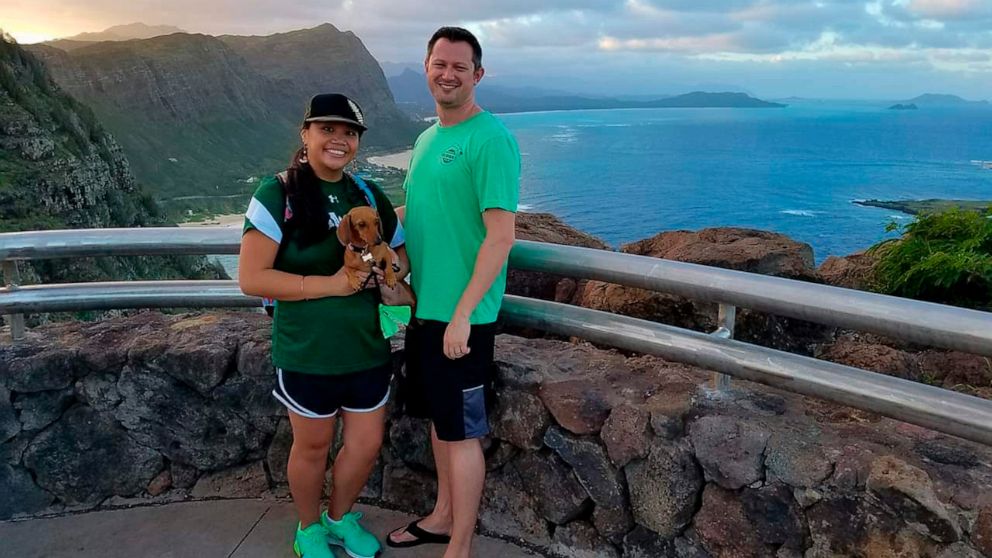 PHOTO: In this December 2016 photo provided by Tracey Calanog shows Michelle Paul and David Paul, along with their dog Zooey, in Hawaii. The couple from Texas died while vacationing in Fiji.
