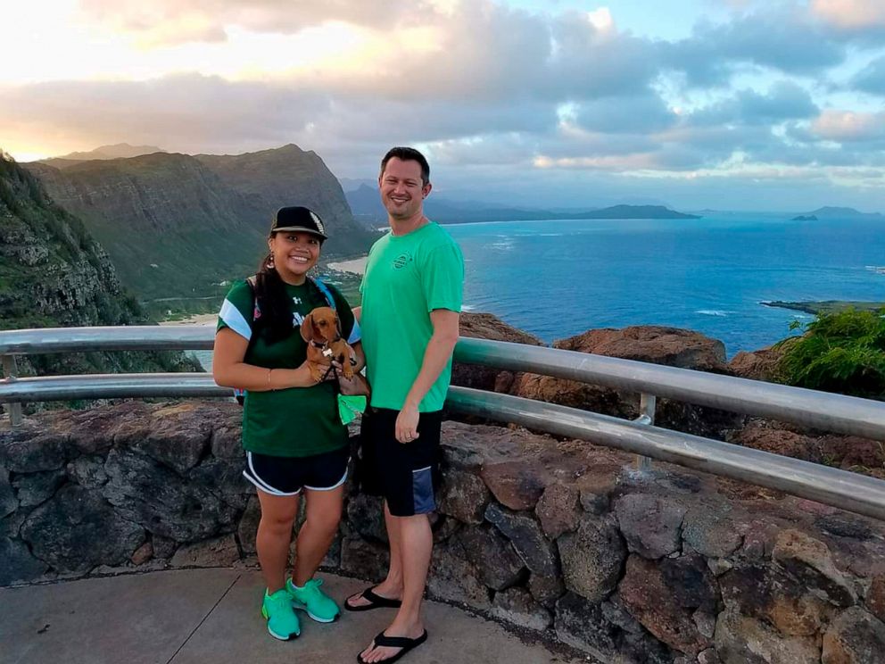 PHOTO: In this December 2016 photo provided by Tracey Calanog shows Michelle Paul and David Paul, along with their dog Zooey, in Hawaii. The couple from Texas died while vacationing in Fiji.