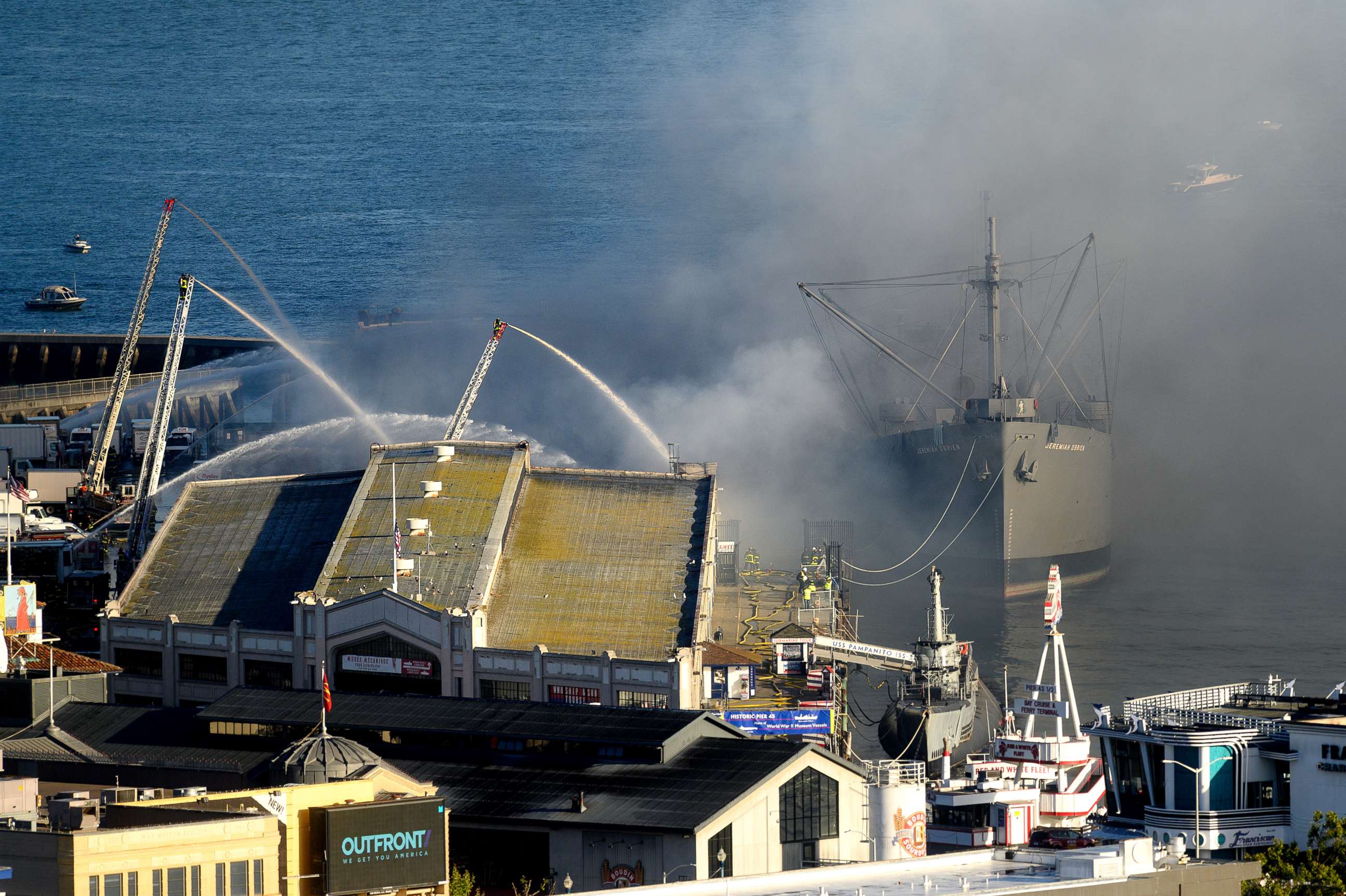 PHOTO: Smoke rises from Pier 45 as a fire burns on May 23, 2020.