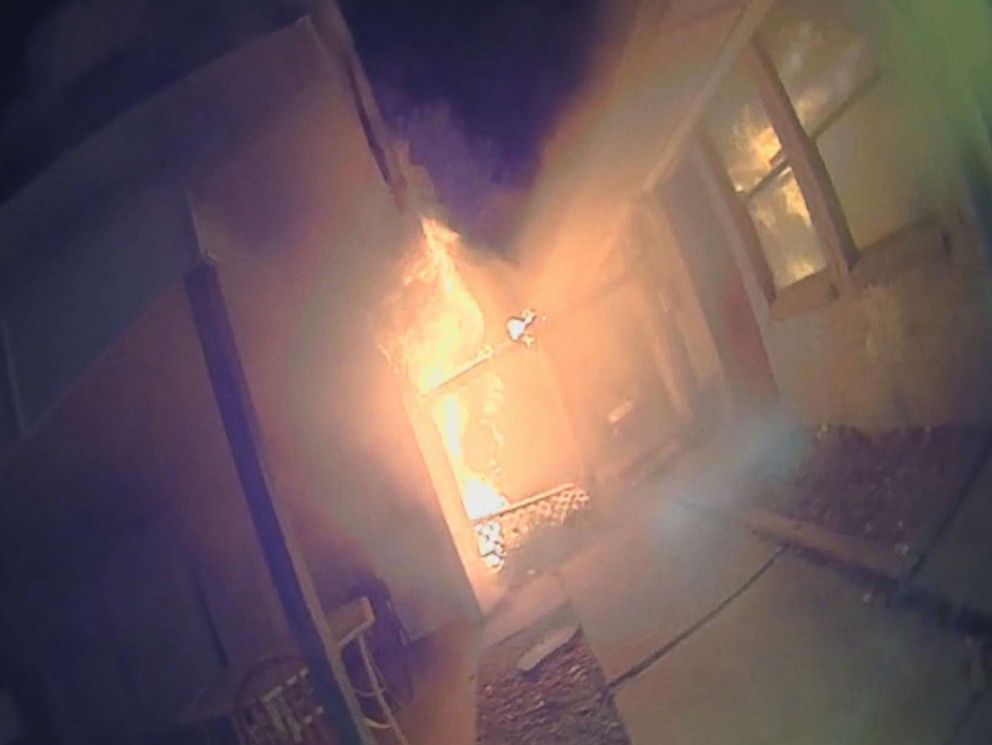 PHOTO: Seagoville Police Officer Sam Click has been praised for his courageous action to save five children age 6 to 10, from burning house, Aug 25, 2018, in Seagoville, Texas.