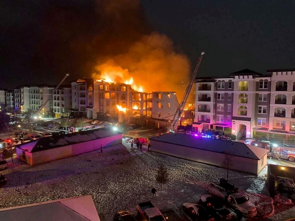 PHOTO: Firefighters work at the scene of an apartment building fire in San Antonio, Texas, Feb. 18, 2021.
