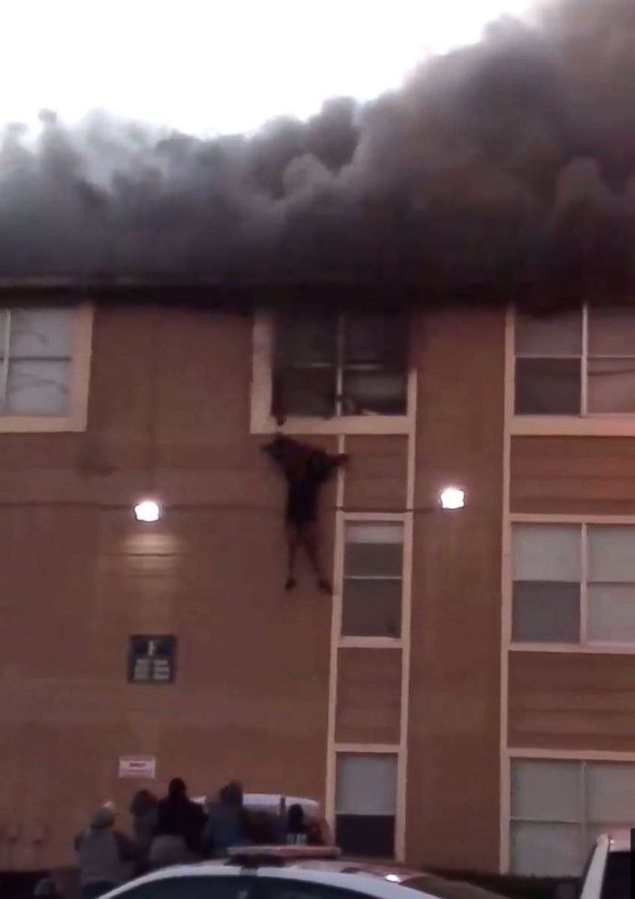 PHOTO: Video shows people jumping from window in Dallas apartment complex fire, Nov. 21, 2018. 