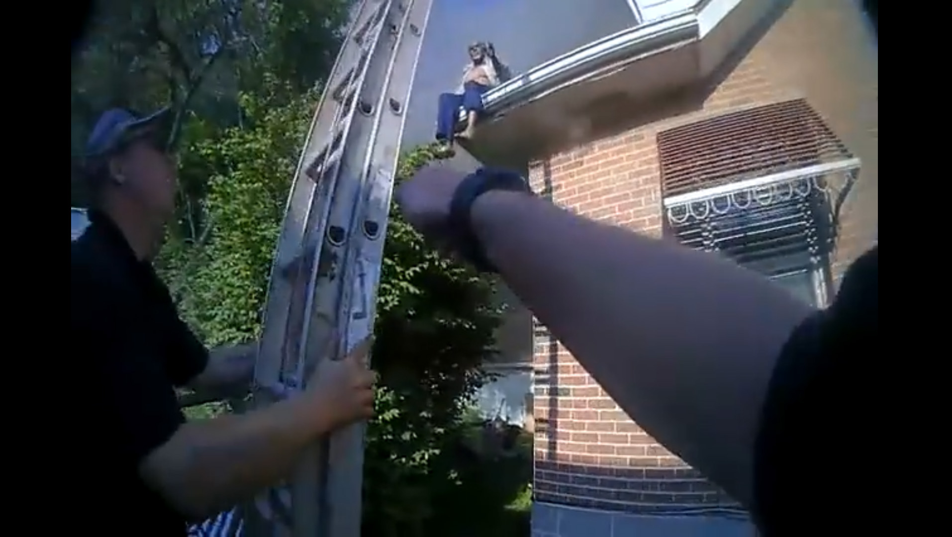 PHOTO: Bodycam video released by police in Bloomfield, Conn., shows officers and firefighters coming to the aid of people trying to escape from a burning home on July 31, 2018.