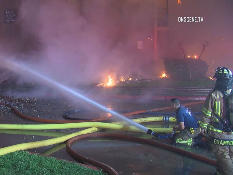 PHOTO: An apartment fire in Houston causes a building to collapse on Feb. 26, 2018.