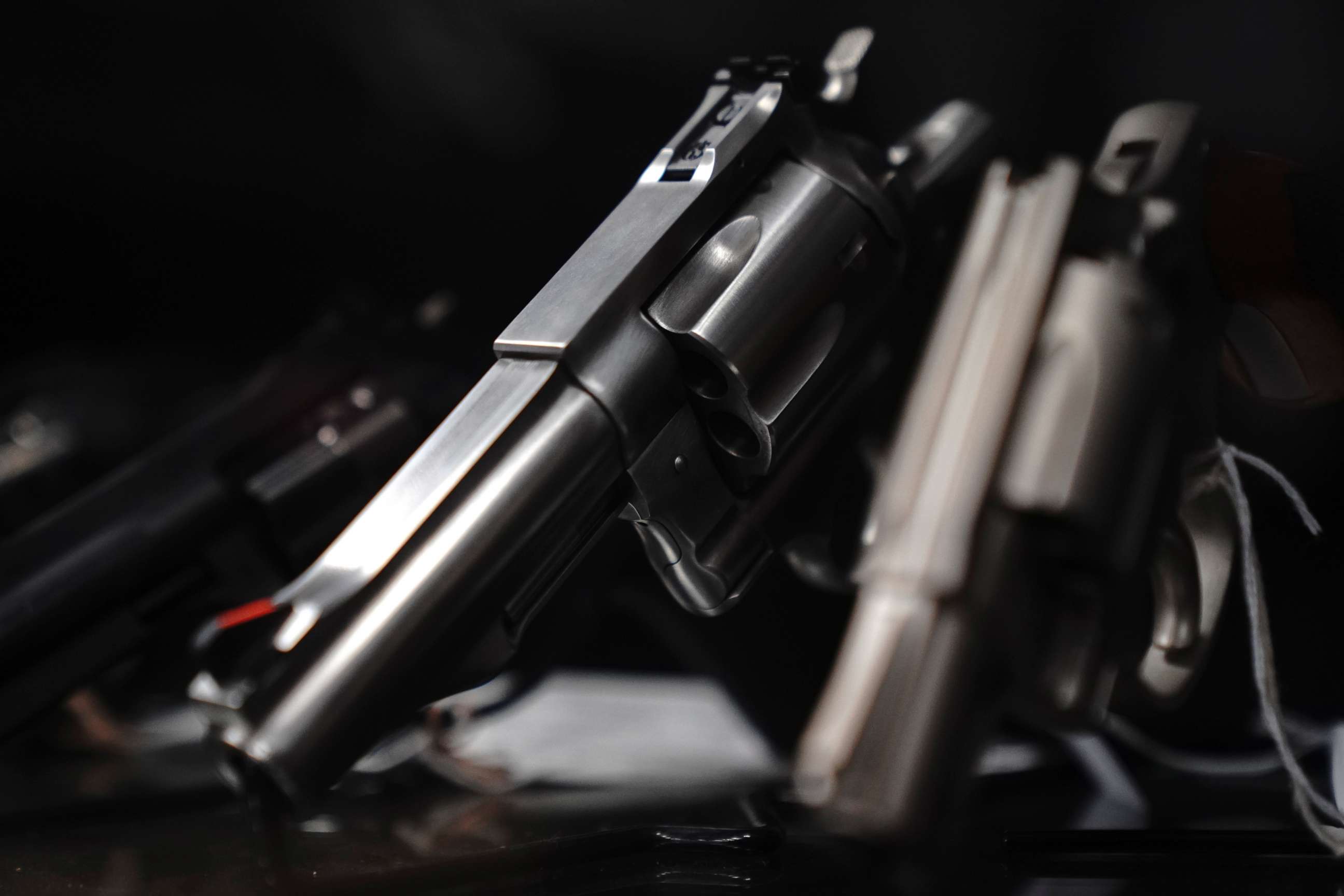 PHOTO: Revolvers are displayed for sale at a gun store in Oceanside, Calif., April 12, 2021.