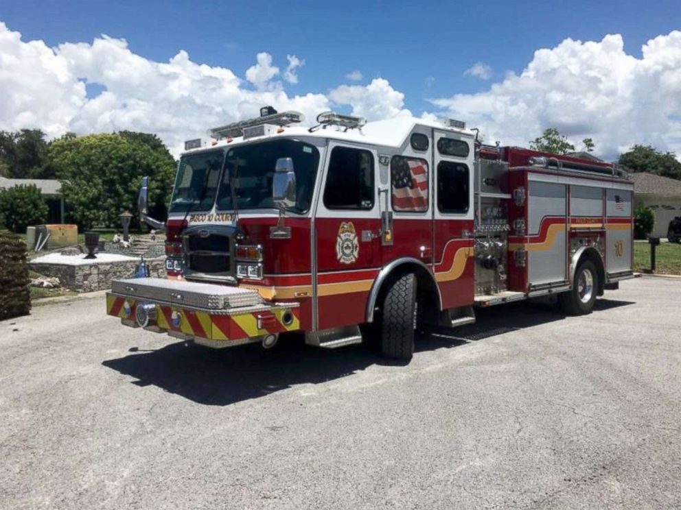 PHOTO: Six firefighters and EMTs in Pasco County, Florida, laid sod for a man after he suffered a heart attack.