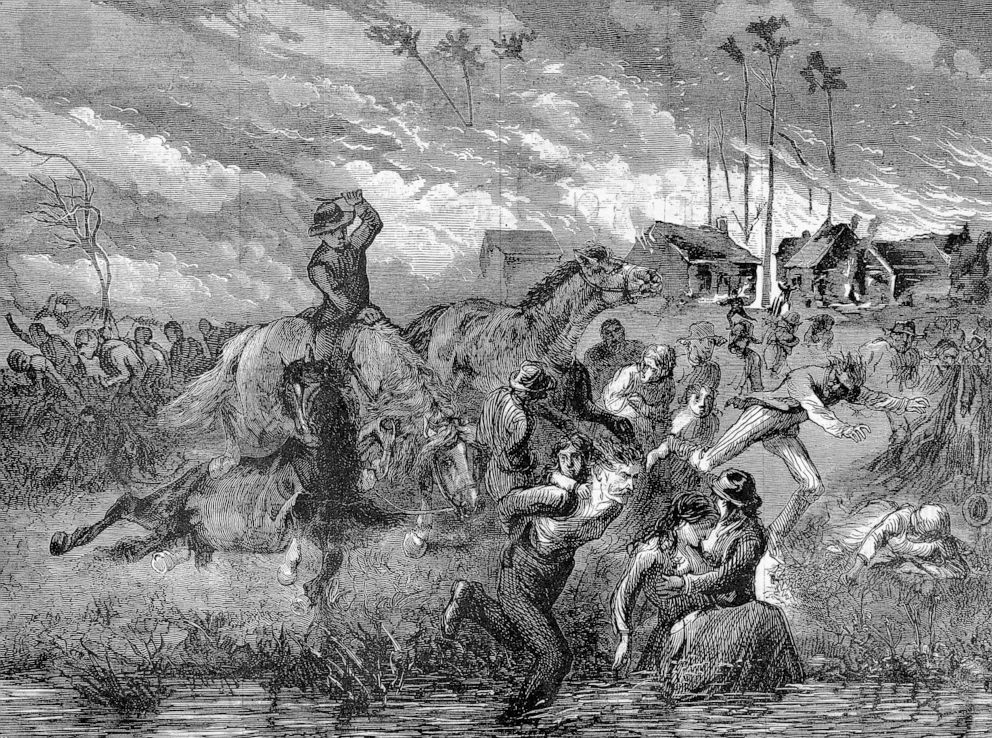 PHOTO: An illustration of The Great Fire of Peshtigo in Wisconsin 1871, shows people trying to run and flee the fire in a chaotic scene.