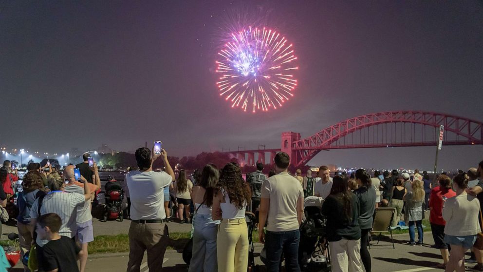 PHOTO: Spectators watch fireworks explode during the Central Astoria annual Independence Day Celebrations fireworks display in Astoria Park on June 29, 2023, in New York.