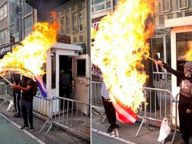 1 arrested, 2 at large after burning flags outside Israeli consulate