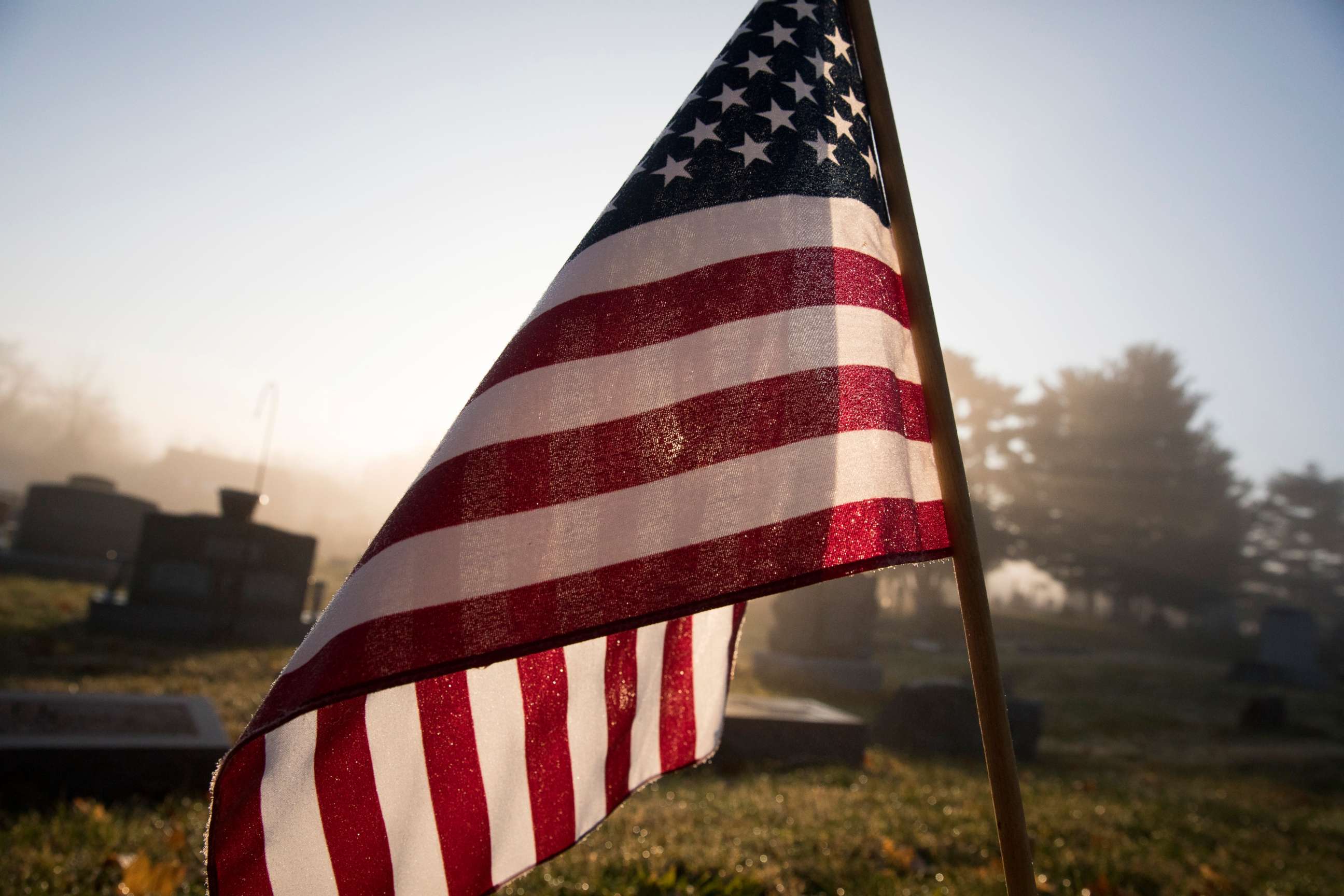 PHOTO: An American flag flies at a grave in this stock photo.