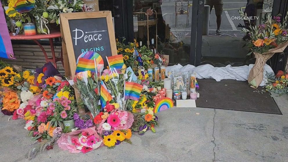 PHOTO: Flowers left at a store in Lake Arrowhead, Calif., where a store owner was shot and killed following a confrontation over a Pride flag on Aug. 18, 2023.
