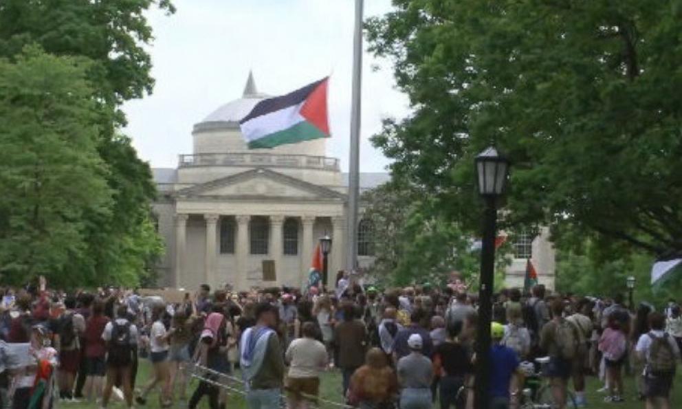 PHOTO: Protesters at c replace an American flag with a Palestinian flag on campus, April 30, 2024.