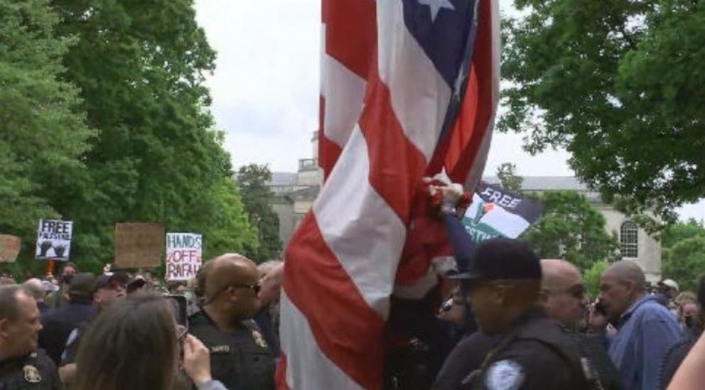 PHOTO: Protesters at UNC Chapel Hill replace an American flag with a Palestinian flag on campus, April 30, 2024.