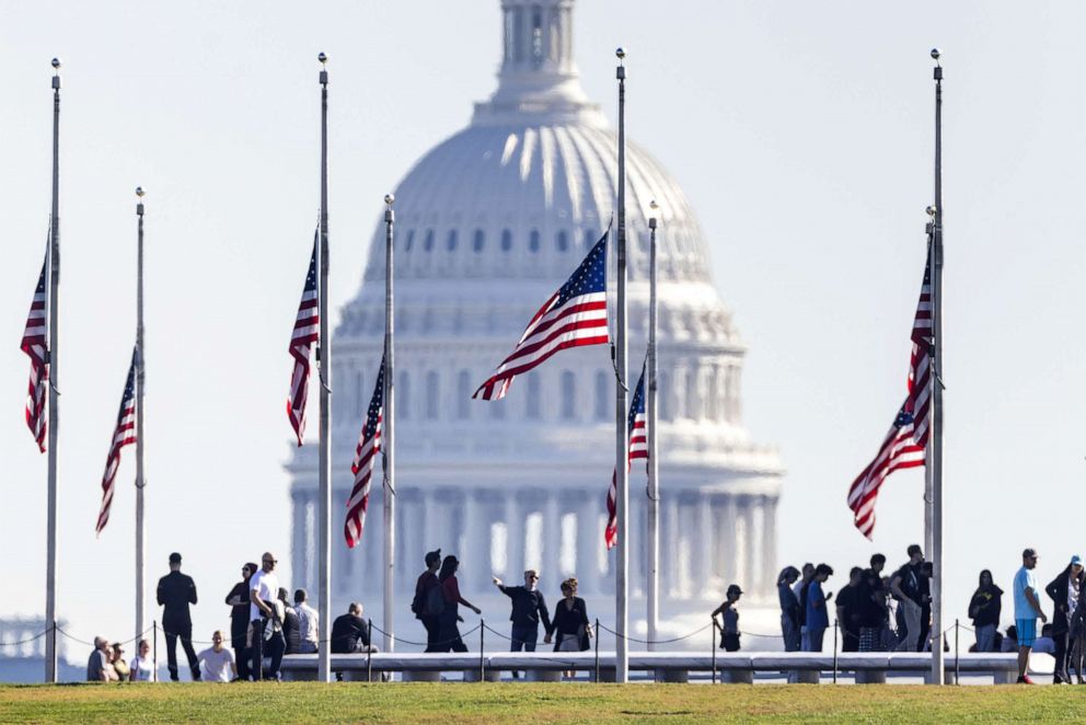 PHOTO: Flags fly at half-staff on the National Mall in Washington, D.C., on Oct 26, 2023 to honor victims of the Oct. 25 mass-shooting in Lewiston Maine.