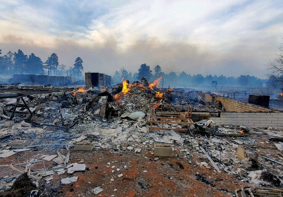 PHOTO: This photo provided by Bill Wells shows his home on the outskirts of Flagstaff, Ariz., destroyed by a wildfire on April 19, 2022.