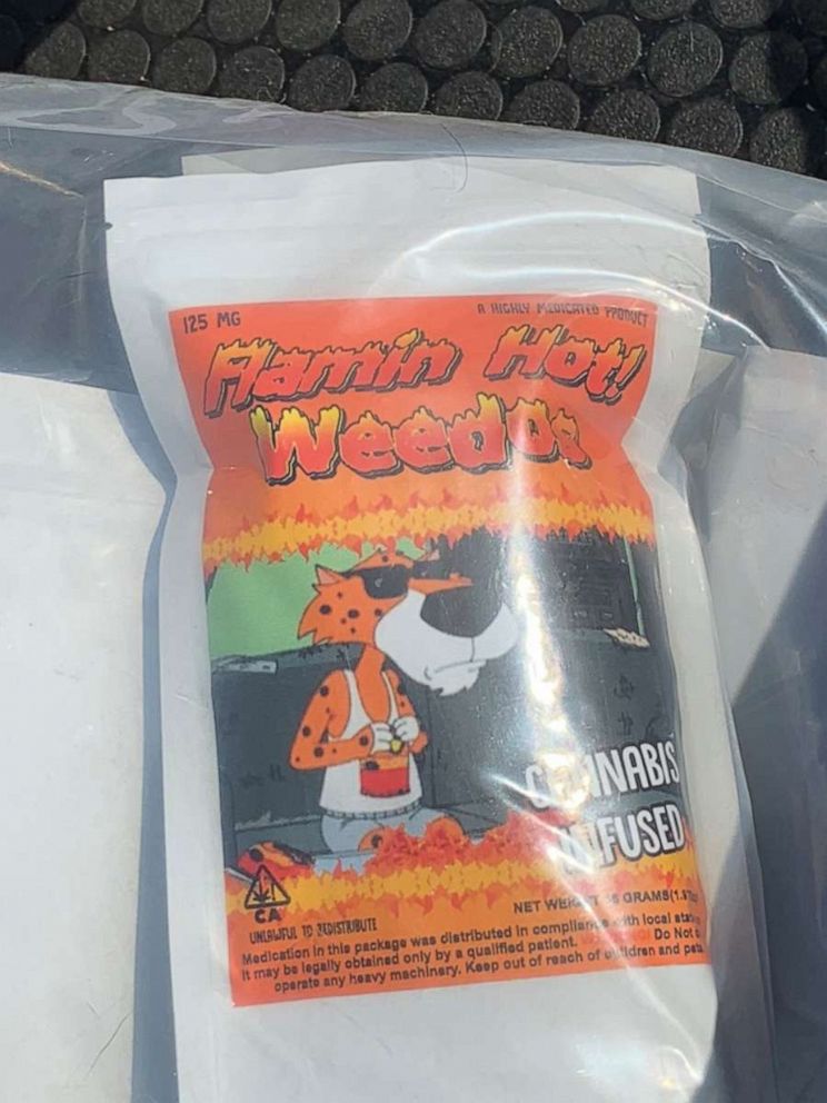 PHOTO: Cannabis-infused snacks, like "Flamin' Hot Weedos," were among the items confiscated from a Phoenix drug lab on Thursday, Sept. 12, 2019. Two men have been arrested.