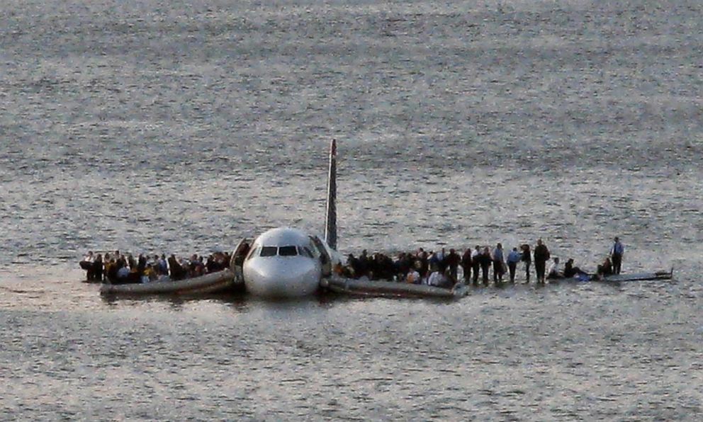 PHOTO: In this Thursday Jan. 15, 2009 file photo, airline passengers wait to be rescued on the wings of a US Airways Airbus 320 jetliner that safely ditched in the frigid waters of the Hudson River in New York.