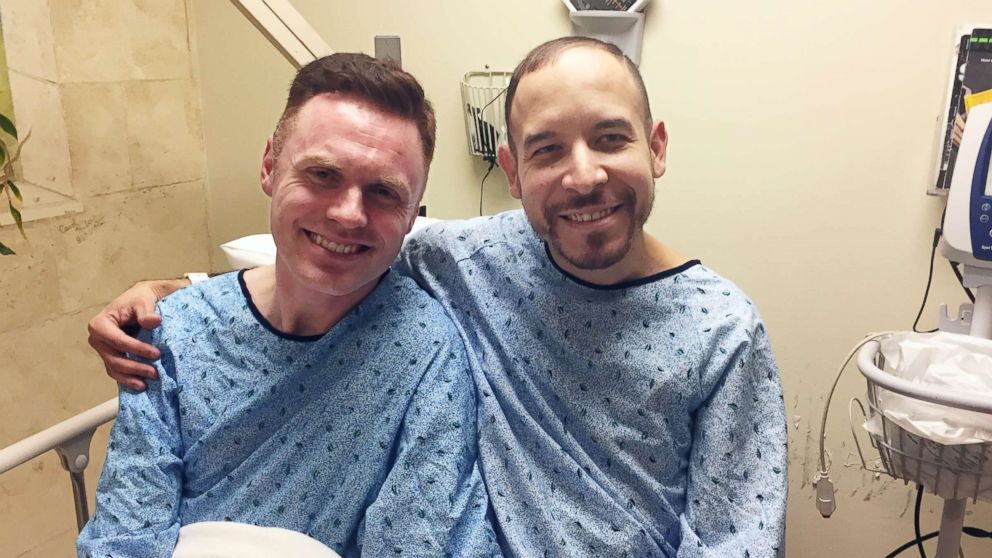 PHOTO: Flight attendant Jair Ripoll poses for a photo with his arm around Steven Lepine after receiving one of Lepine's kidneys on Dec. 6, 2017, at Saint Barnabas Medical Center in Livingston, N.J.