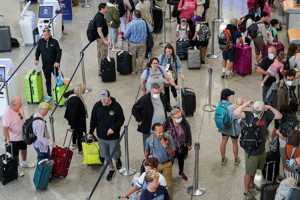 PHOTO: Passengers are seen at the Delta Air Lines check in area before their flights at Hartsfield-Jackson Atlanta International Airport in Atlanta, June 28, 2022.