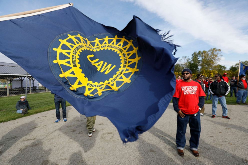 PHOTO: United Auto Workers union members and their families rally near the General Motors Flint Assembly plant on Solidarity Sunday on Oct. 13, 2019 in Flint, Mich. 